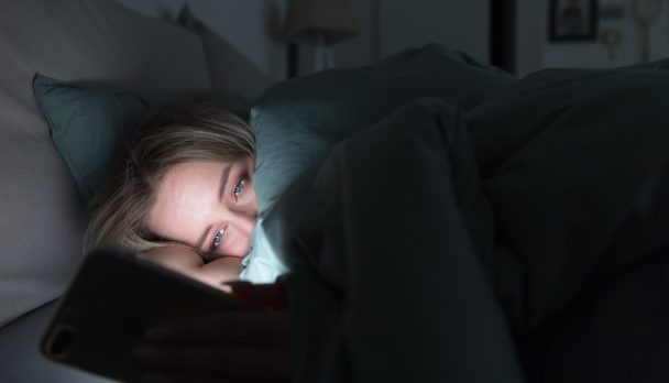 Portrait,Of,Young,Sleepy,Tired,Woman,Lying,In,Bed,Under